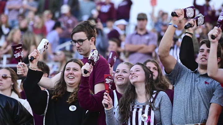 Mississippi State Bulldogs fans cheer during the first quarter against the Missouri Tigers at Davis Wade Stadium at Scott Field. Mississippi State Bulldogs fans cheer during the first quarter against the Missouri Tigers at Davis Wade Stadium at Scott Field.