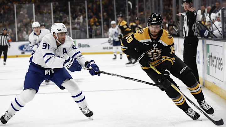 Oct 26, 2024; Boston, Massachusetts, USA; Boston Bruins right wing David Pastrnak (88) tries to get around Toronto Maple Leafs center John Tavares (91) during the first period at TD Garden. Mandatory Credit: Winslow Townson-Imagn Images