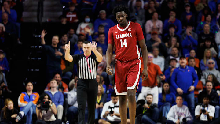 Feb 1, 2026; Gainesville, Florida, USA; Alabama Crimson Tide center Charles Bediako (14) reacts after a foul call by the referee against the Florida Gators during the second half at Exactech Arena at the Stephen C. O'Connell Center. Mandatory Credit: Matt Pendleton-Imagn Images