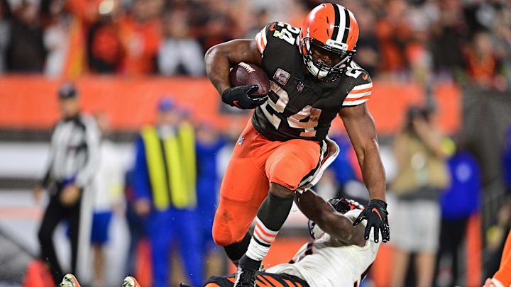 Oct 31, 2022; Cleveland, Ohio, USA; Cleveland Browns running back Nick Chubb (24) steps over Cincinnati Bengals linebacker Germaine Pratt (57) after scoring a touchdown in the fourth quarter at FirstEnergy Stadium. Oct 31, 2022; Cleveland, Ohio, USA; Cleveland Browns running back Nick Chubb (24) steps over Cincinnati Bengals linebacker Germaine Pratt (57) after scoring a touchdown in the fourth quarter at FirstEnergy Stadium.