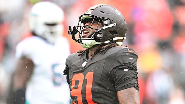 Oct 19, 2025; Cleveland, Ohio, USA; Cleveland Browns defensive end Alex Wright (91) celebrates after a play against the Miami Dolphins during the first quarter at Huntington Bank Field. Mandatory Credit: Ken Blaze-Imagn Images Oct 19, 2025; Cleveland, Ohio, USA; Cleveland Browns defensive end Alex Wright (91) celebrates after a play against the Miami Dolphins during the first quarter at Huntington Bank Field. Mandatory Credit: Ken Blaze-Imagn Images
