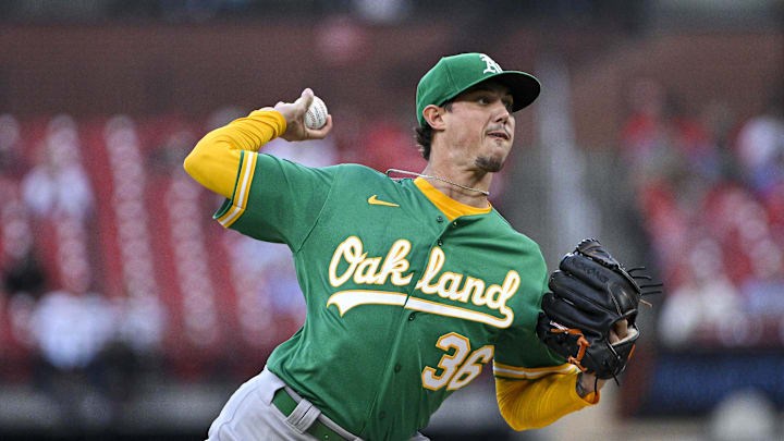 Oakland Athletics starting pitcher Spenser Watkins (36) pitches against the St. Louis Cardinals during the first inning at Busch Stadium in 2023.
