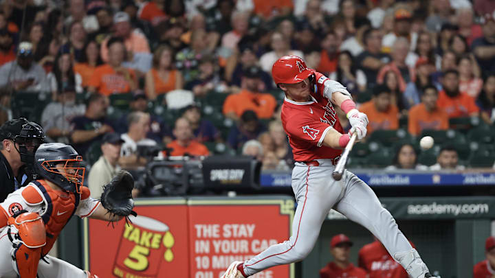 Sep 21, 2024; Houston, Texas, USA; Los Angeles Angels catcher Logan O'Hoppe (14) hits a double against the Houston Astros in the sixth inning at Minute Maid Park. Mandatory Credit: Thomas Shea-Imagn Images Sep 21, 2024; Houston, Texas, USA; Los Angeles Angels catcher Logan O'Hoppe (14) hits a double against the Houston Astros in the sixth inning at Minute Maid Park. Mandatory Credit: Thomas Shea-Imagn Images