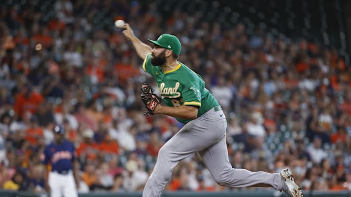 Oakland Athletics relief pitcher Lou Trivino (62) delivers a pitch during the ninth inning against the Houston Astros at Minute Maid Park in 2022.