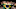 A protester holds a Brasilian flag during a protest against... A protester holds a Brasilian flag during a protest against...