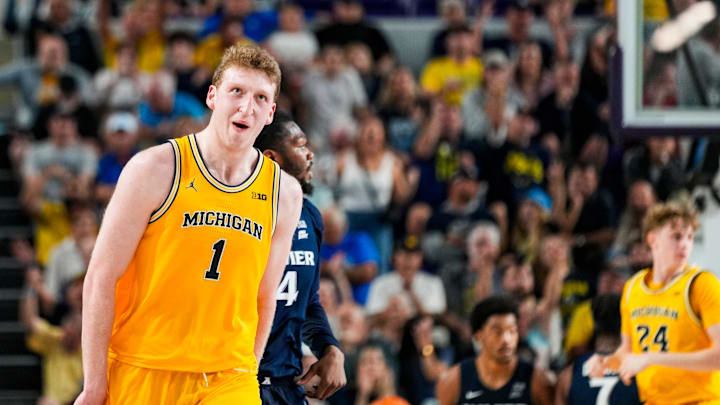 Michigan Wolverines center Danny Wolf (1) reacts after scoring during the first half of the Fort Myers Tip-Off Beach Division final against the Xavier Musketeers at Suncoast Credit Union Arena in Fort Myers, Fla., on Wednesday, Nov. 27, 2024.