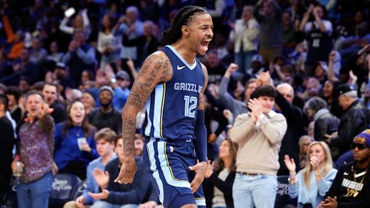 Dec 21, 2023; Memphis, Tennessee, USA; Memphis Grizzlies guard Ja Morant (12) reacts during the