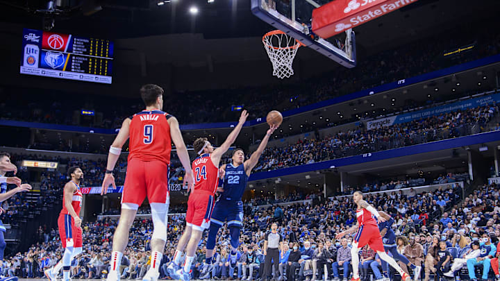 Jan 29, 2022; Memphis, Tennessee, USA; Memphis Grizzlies guard Desmond Bane (22) drives to the basket past Washington Wizards forward Deni Avdija (9) and forward Corey Kispert (24) during the second half at the FedExForum. Mandatory Credit: Jerome Miron-Imagn Images Jan 29, 2022; Memphis, Tennessee, USA; Memphis Grizzlies guard Desmond Bane (22) drives to the basket past Washington Wizards forward Deni Avdija (9) and forward Corey Kispert (24) during the second half at the FedExForum. Mandatory Credit: Jerome Miron-Imagn Images