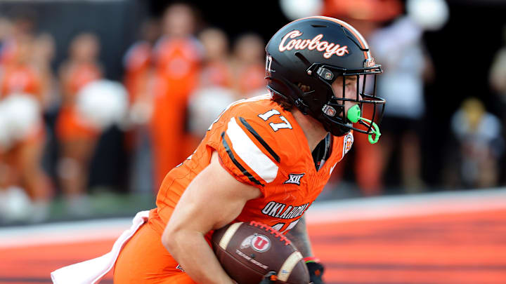 Oklahoma State's Gavin Freeman (17) returns a kick in the second half of the college football between the Oklahoma State University Cowboys and the Utah Utes at Boone Pickens Stadium in Stillwater, Okla., Saturday, Sept., 21, 2024.