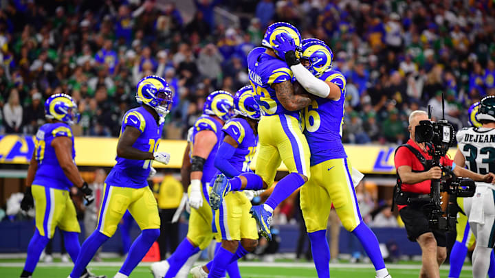 Nov 24, 2024; Inglewood, California, USA; Los Angeles Rams running back Kyren Williams (23) celebrates his touchdown scored against the Philadelphia Eagles with tight end Colby Parkinson (86) during the first half at SoFi Stadium. Mandatory Credit: Gary A. Vasquez-Imagn Images