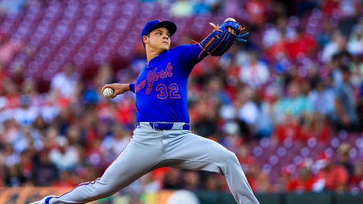 Mets starting pitcher Tobias Myers (32) pitches against the Cincinnati Reds in the first inning at Great American Ball Park. Mets starting pitcher Tobias Myers (32) pitches against the Cincinnati Reds in the first inning at Great American Ball Park.