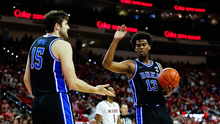 Mar 4, 2024; Raleigh, North Carolina, USA; Duke basketball center Ryan Young (15) and  forward Sean Stewart