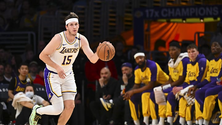 Mar 22, 2025; Los Angeles, California, USA; Los Angeles Lakers guard Austin Reaves (15) moves the ball against the Chicago Bulls during the first half at Crypto.com Arena. Mandatory Credit: Jonathan Hui-Imagn Images
