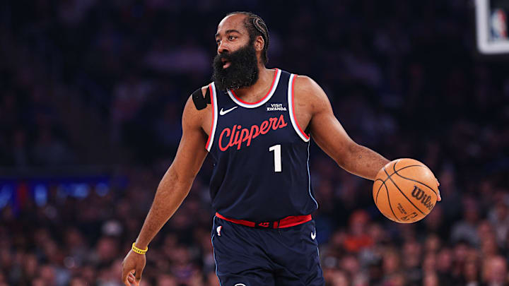 Jan 7, 2026; New York, New York, USA; LA Clippers guard James Harden (1) dribbles up court against the New York Knicks during the first quarter at Madison Square Garden. Mandatory Credit: Vincent Carchietta-Imagn Images