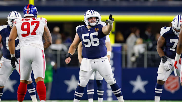 Dallas Cowboys center Cooper Beebe signals at the line against the New York Giants