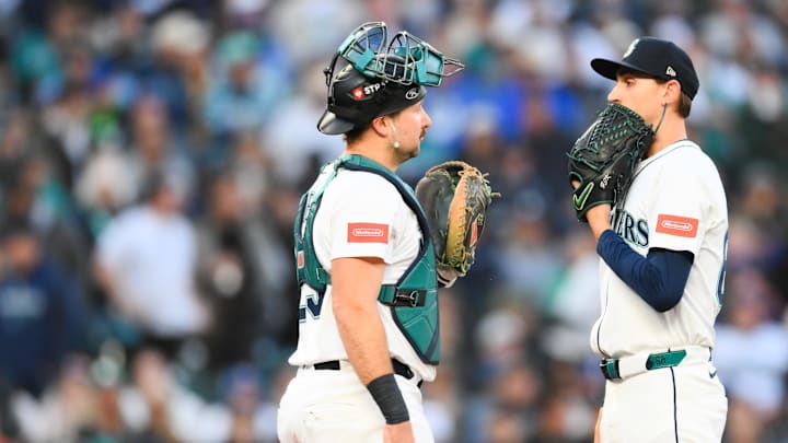 Oct 15, 2025; Seattle, Washington, USA; Seattle Mariners catcher Cal Raleigh (29) visits Seattle Mariners pitcher George Kirby (68) on the mound during the third inning against the Toronto Blue Jays during game three of the ALCS round for the 2025 MLB playoffs at T-Mobile Park. Mandatory Credit: Steven Bisig-Imagn Images