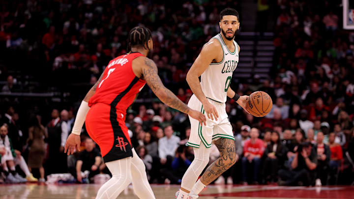 Jan 3, 2025; Houston, Texas, USA; Boston Celtics forward Jayson Tatum (0) handles the ball against Houston Rockets guard Cam Whitmore (7) during the game at Toyota Center. Mandatory Credit: Erik Williams-Imagn Images Jan 3, 2025; Houston, Texas, USA; Boston Celtics forward Jayson Tatum (0) handles the ball against Houston Rockets guard Cam Whitmore (7) during the game at Toyota Center. Mandatory Credit: Erik Williams-Imagn Images