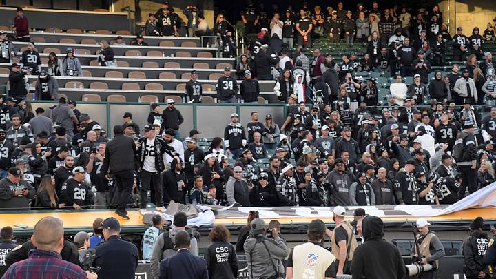 Dec 15, 2019; Oakland, CA, USA; Oakland Raiders tear down banners after the Raiders final game Dec 15, 2019; Oakland, CA, USA; Oakland Raiders tear down banners after the Raiders final game