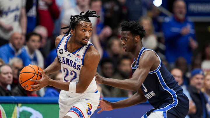 Jan 31, 2026; Lawrence, Kansas, USA; Kansas Jayhawks guard Darryn Peterson (22) looks to pass against BYU Cougars forward AJ Dybantsa (3) during the first half at Mizzou Arena. Mandatory Credit: Jay Biggerstaff-Imagn Images Jan 31, 2026; Lawrence, Kansas, USA; Kansas Jayhawks guard Darryn Peterson (22) looks to pass against BYU Cougars forward AJ Dybantsa (3) during the first half at Mizzou Arena. Mandatory Credit: Jay Biggerstaff-Imagn Images