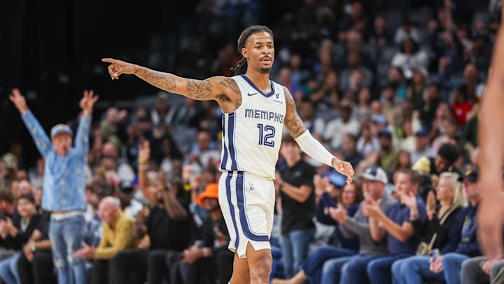 Oct 25, 2025; Memphis, Tennessee, USA; Memphis Grizzlies guard Ja Morant (12) reacts after a made basket against the Indiana Pacers during the first half at FedExForum. Mandatory Credit: Wesley Hale-Imagn Images Oct 25, 2025; Memphis, Tennessee, USA; Memphis Grizzlies guard Ja Morant (12) reacts after a made basket against the Indiana Pacers during the first half at FedExForum. Mandatory Credit: Wesley Hale-Imagn Images