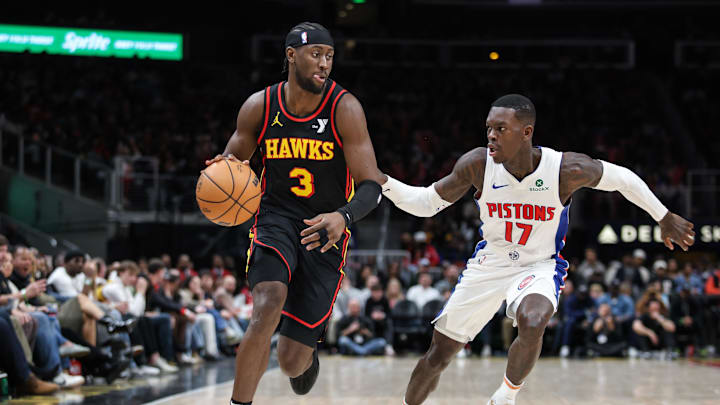 Feb 23, 2025; Atlanta, Georgia, USA; Atlanta Hawks guard Caris LeVert (3) dribbles the ball down the court against Detroit Pistons guard Dennis Schroder (17) during the third quarter at State Farm Arena. Mandatory Credit: Jordan Godfree-Imagn Images