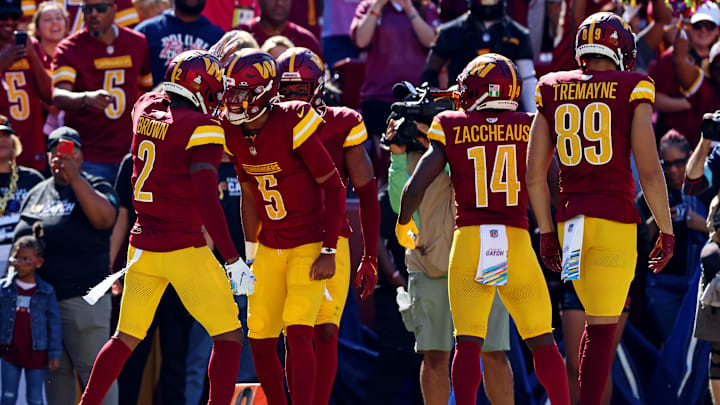 Oct 6, 2024; Landover, Maryland, USA; Washington Commanders wide receiver Dyami Brown (2) celebrates with quarterback Jayden Daniels (5) after scoring a touchdown during the second quarter against the Cleveland Browns at NorthWest Stadium. Mandatory Credit: Peter Casey-Imagn Images Oct 6, 2024; Landover, Maryland, USA; Washington Commanders wide receiver Dyami Brown (2) celebrates with quarterback Jayden Daniels (5) after scoring a touchdown during the second quarter against the Cleveland Browns at NorthWest Stadium. Mandatory Credit: Peter Casey-Imagn Images
