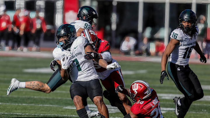 Indiana Hoosiers defensive back Kobee Minor (5) tackles...