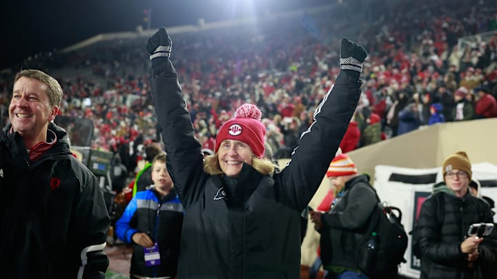 Indiana University athletics director Scott Dobson (left)...