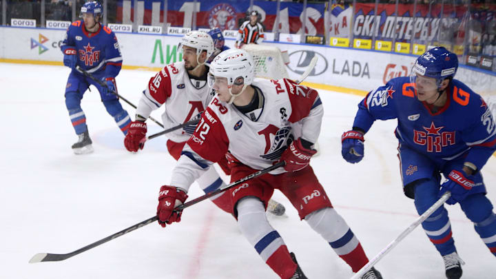 Maxim Berezkin (72) Lokomotiv Hockey Club and Nikita Zaitsev...