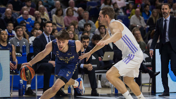 Urban Klavzar (L) and Fabien Causuer (R) during Real Madrid...