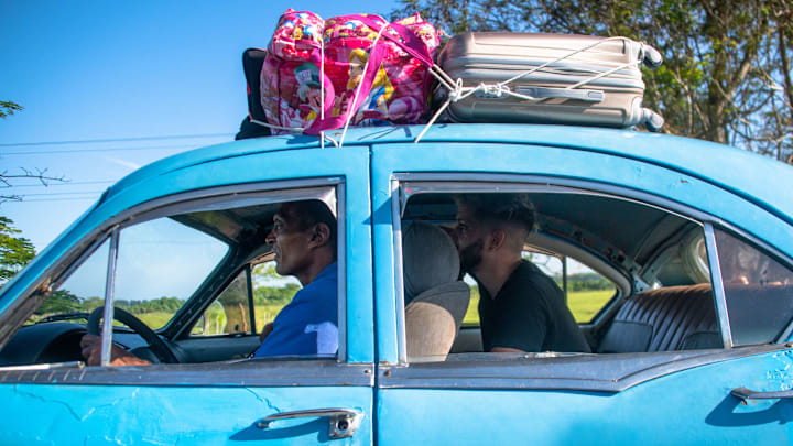 Close up of an old vintage car transporting luggage