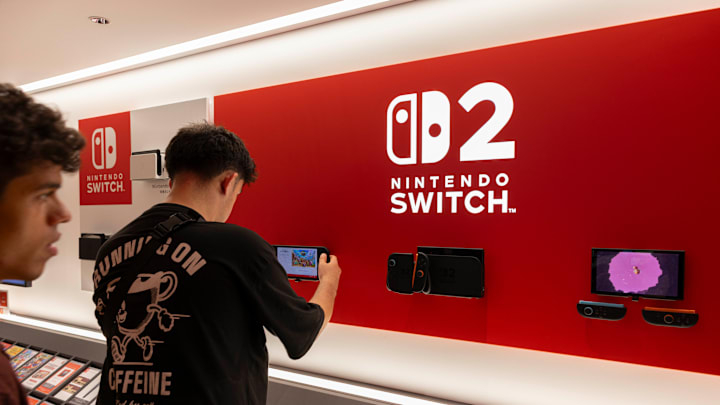 Visitors take a closer look at the newly released Nintendo...