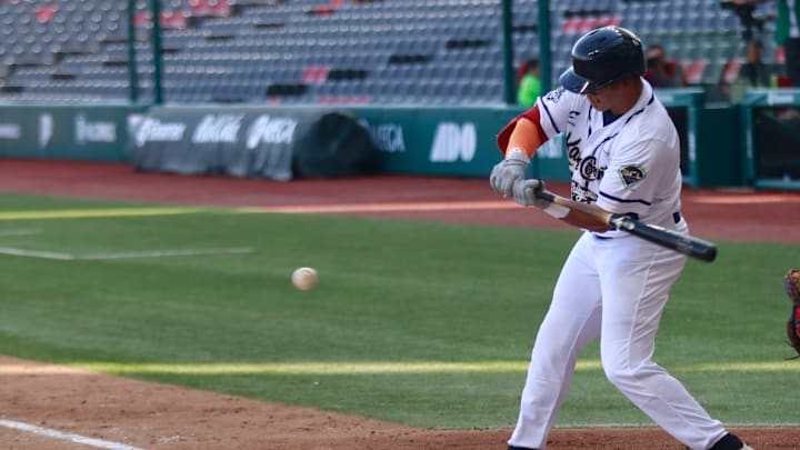Dayson Croes #12 of Kane County Cougars at the bat during...