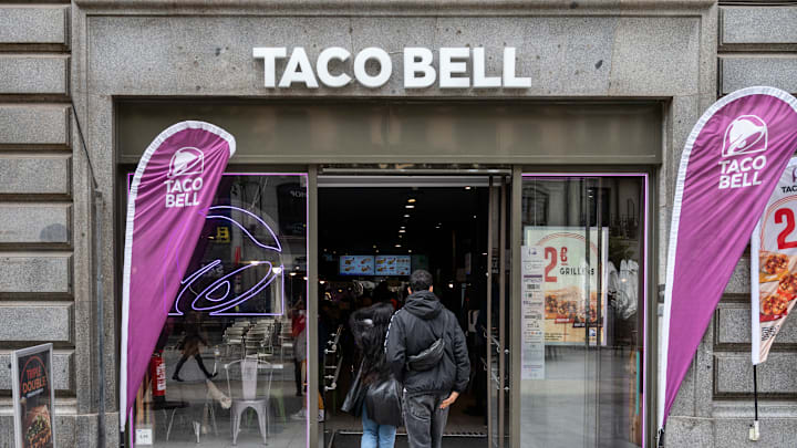 Customers walk into the American chain of fast-food...