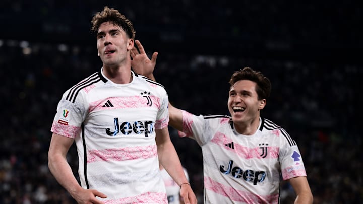 Dusan Vlahovic (L) of Juventus FC celebrates with Federico...