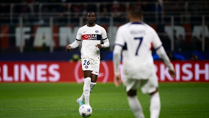 Nordi Mukiele (L) of Paris Saint-Germain FC in action next...