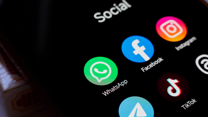 In this photo illustration, WhatsApp, Facebook, Instagram,...