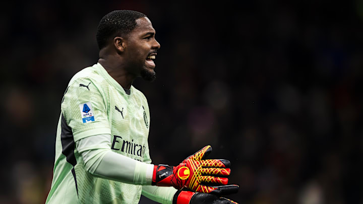 Mike Maignan of AC Milan reacts during the Serie A football...