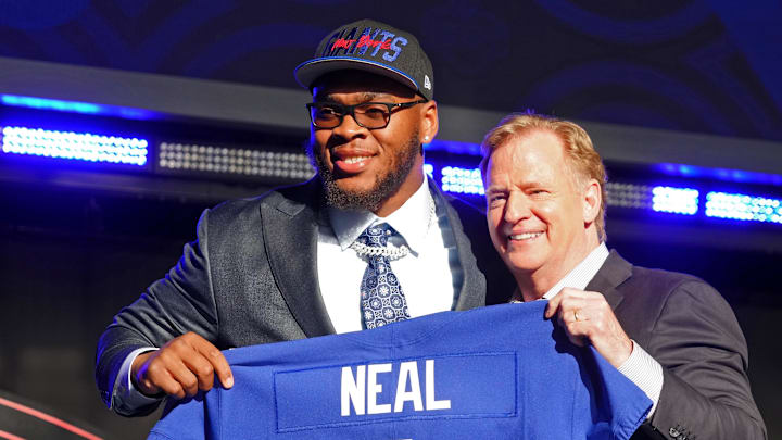 Apr 28, 2022; Las Vegas, NV, USA; Alabama offensive tackle Evan Neal with NFL commissioner Roger Goodell after being selected as the seventh overall pick to the New York Giants during the first round of the 2022 NFL Draft at the NFL Draft Theater. Mandatory Credit: Kirby Lee-Imagn Images