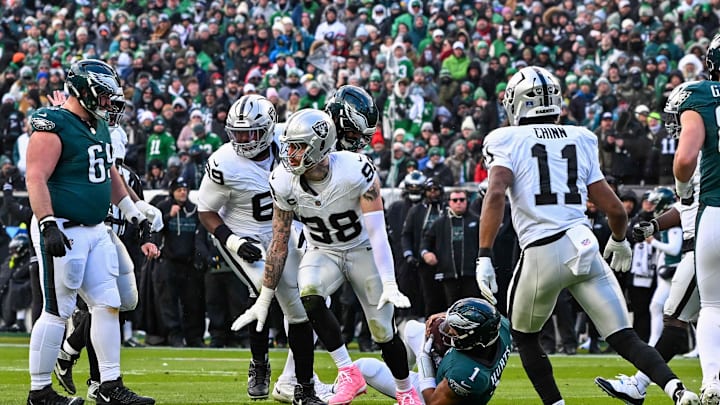 Dec 14, 2025; Philadelphia, Pennsylvania, USA; Las Vegas Raiders defensive end Maxx Crosby (98) celebrates his sacks of Philadelphia Eagles quarterback Jalen Hurts (1) during the second quarter at Lincoln Financial Field. Mandatory Credit: Eric Hartline-Imagn Images
