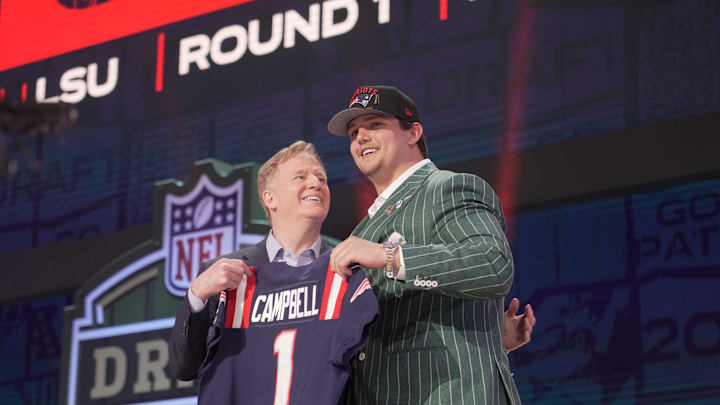NFL commissioner Roger Goodell poses with Offensive Tackle Will Campbell of LSU after he is selected by the New England Patriots 