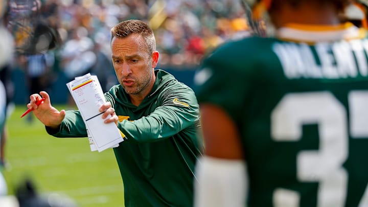 Green Bay Packers defensive coordinator Jeff Hafley gives instruction during a drill with defensive backs on Saturday, July 27, 2024, at Ray Nitschke Field in Ashwaubenon, Wis.