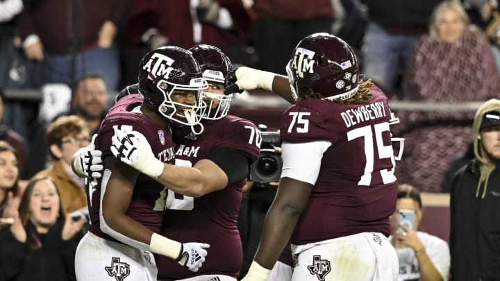 Nov 26, 2022; College Station, Texas, USA;  Texas A&M Aggies tight end Donovan Green (18) celebrates his touchdown during the second quarter against the LSU Tigers at Kyle Field. Mandatory Credit: Maria Lysaker-USA TODAY Sports