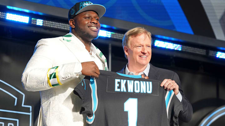 Apr 28, 2022; Las Vegas, NV, USA; North Carolina State offensive tackle Ikem Ekwonu with NFL commissioner Roger Goodell after being selected as the sixth overall pick to the Carolina Panthers during the first round of the 2022 NFL Draft at the NFL Draft Theater. Mandatory Credit: Kirby Lee-Imagn Images
