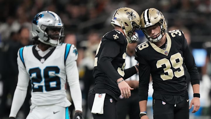 Dec 14, 2025; New Orleans, Louisiana, USA; New Orleans Saints place kicker Charlie Smyth (39) celebrates with punter Kai Kroeger (32) after a field goal during the third quarter against the Carolina Panthers at Caesars Superdome. Mandatory Credit: Matthew Hinton-Imagn Images Dec 14, 2025; New Orleans, Louisiana, USA; New Orleans Saints place kicker Charlie Smyth (39) celebrates with punter Kai Kroeger (32) after a field goal during the third quarter against the Carolina Panthers at Caesars Superdome. Mandatory Credit: Matthew Hinton-Imagn Images