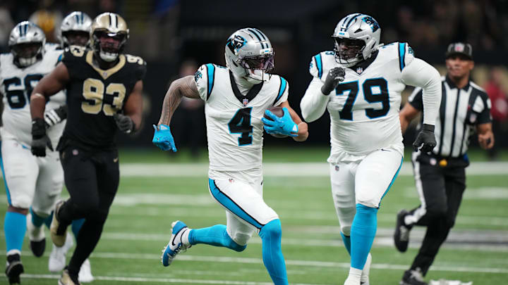 Dec 14, 2025; New Orleans, Louisiana, USA; Carolina Panthers wide receiver Tetairoa McMillan (4) runs the ball during the second quarter against the New Orleans Saints at Caesars Superdome. Mandatory Credit: Matthew Hinton-Imagn Images