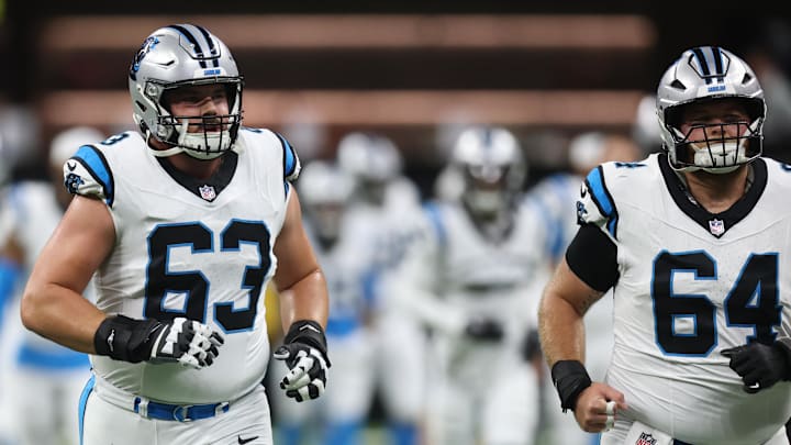 Dec 14, 2025; New Orleans, Louisiana, USA; Carolina Panthers center Austin Corbett (63) runs on the field before the game against the New Orleans Saints at Caesars Superdome. Mandatory Credit: Stephen Lew-Imagn Images