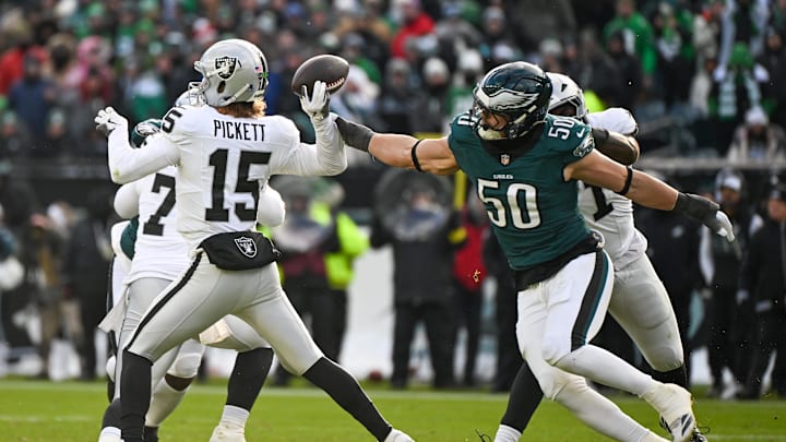 Las Vegas Raiders quarterback Kenny Pickett (15) throws the ball as Philadelphia Eagles linebacker Jaelan Phillips