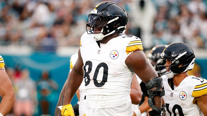 Aug 9, 2025; Jacksonville, Florida, USA; Pittsburgh Steelers tight end Darnell Washington (80) celebrates after scoring a touchdown against the Jacksonville Jaguars during a preseason game at EverBank Stadium. Mandatory Credit: Travis Register-Imagn Images