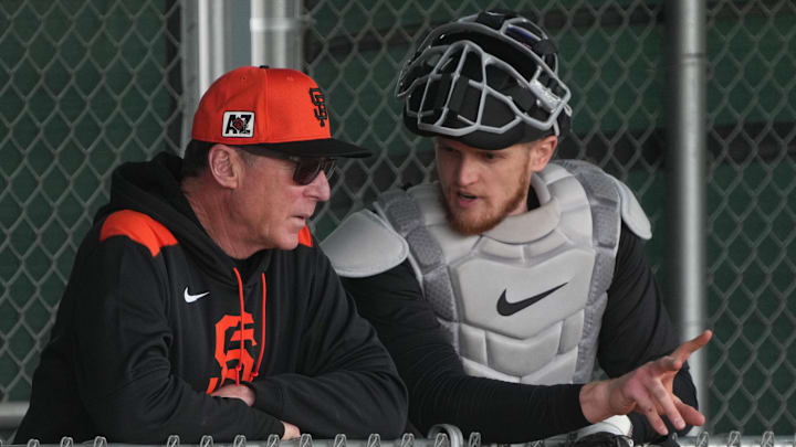 Feb 13, 2025; Scottsdale, AZ, USA; San Francisco Giants manager Bob Melvin (6) talks to a catcher in the bullpen during spring training camp. Feb 13, 2025; Scottsdale, AZ, USA; San Francisco Giants manager Bob Melvin (6) talks to a catcher in the bullpen during spring training camp.